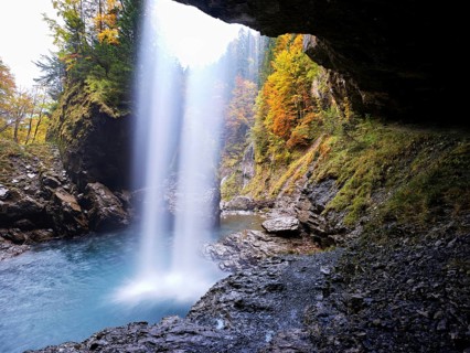 Waterfall mountain list in autumn-colored surroundings, Linthal, Klausenpass, Canton of Glarus,