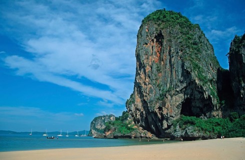 Rocks and boats on Pranang Cave beach, two years in front of the tsunami, Krabi, Thailand, December