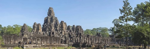 Panoramic picture of the south side of Bayon Temple, with huge stone-carved faces of Bodhisattva