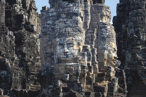 Huge stone-carved faces of Bodhisattva Lokeshvara, also Avalokiteshvara, Bayon Temple, Angkor Thom,
