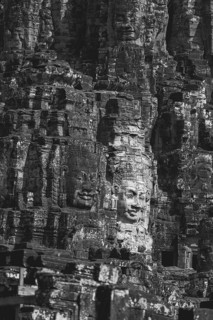 Huge stone-carved faces of Bodhisattva Lokeshvara, also Avalokiteshvara, Bayon Temple, Angkor Thom,