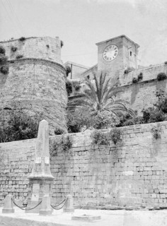 Lascaris clock tower and fortress defensive walls of the Citadel, Victoria, Island of Gozo, Malta,