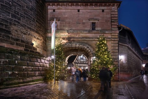Decorated entrance to the Handwerkerhof during Advent, Königstor, Nuremberg, Middle Franconia,