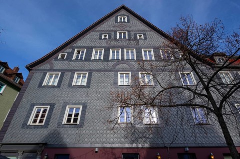 Historic slate façade of a residential building from 1665, Gustavstraße 48 and 50, Fürth, Middle