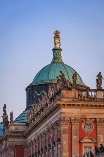 Figures and statues at the new palace in Sanssouci Park in the evening light, Potsdam