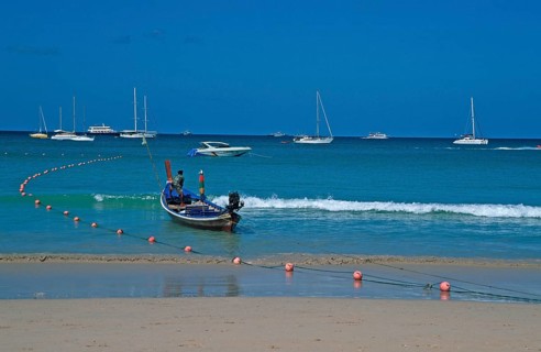 Longtail boat and yachts on Patong Beach, Ko Phuket, two years in front of the tsunami, Thailand,