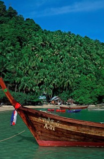 Bamboo huts, longtail boat on Ko Phi Phi Don beach, two years in front of the tsunami, Thailand,
