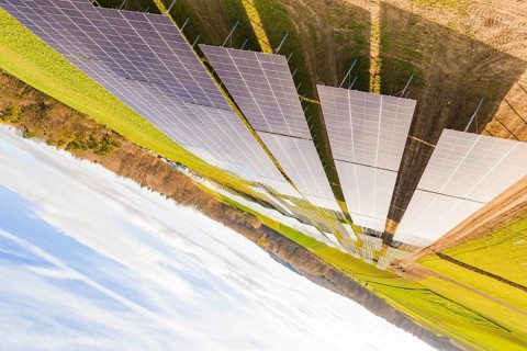 Diagonally arranged solar modules on green fields for energy generation, energy transition,