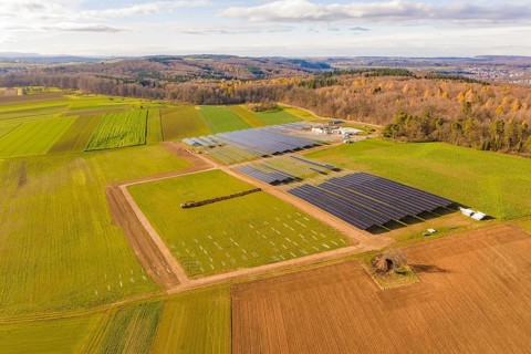 Extensive solar systems in a green and brown landscape, energy revolution, construction of PV open