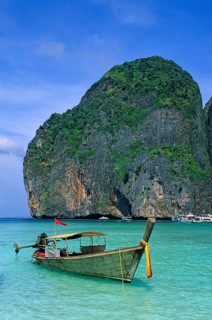 Longtail boat on Maya Bay beach, known from the movie The Beach, one year in front of the tsunami,