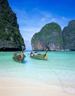 Longtail boats on Maya Bay beach, known from the movie The Beach, one year in front of the tsunami,