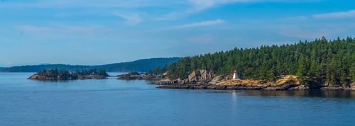 Passengers traveling by ferry from vancouver to victoria, british columbia, enjoying scenic views