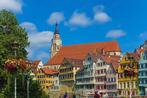 Historic old town, Neckar front, houses, colorful facades, collegiate church, people, cyclists,