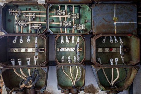 Old power box, dilapidated plant of a former agricultural production cooperative of the former GDR,
