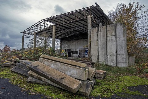Old building, dilapidated site of a former agricultural production cooperative of the former GDR,