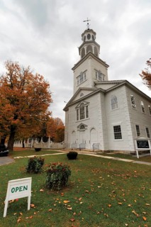 First Congregational Church of Bennington, historic church, multi-tiered bell tower, sign opened,