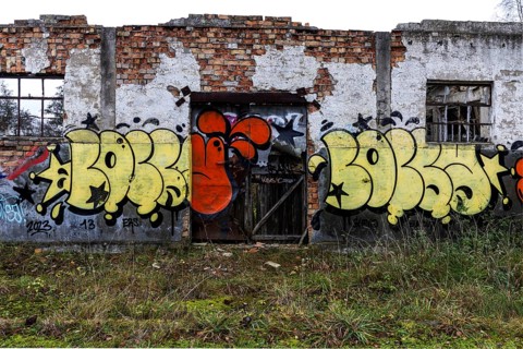 Dilapidated hall of the dilapidated plant of a former agricultural production cooperative of the