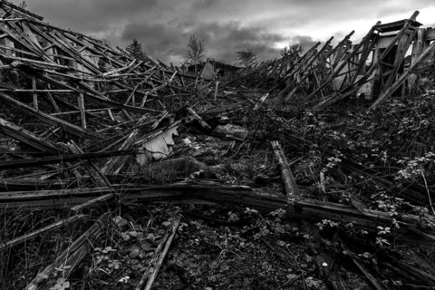 Dilapidated hall of the dilapidated plant of a former agricultural production cooperative of the