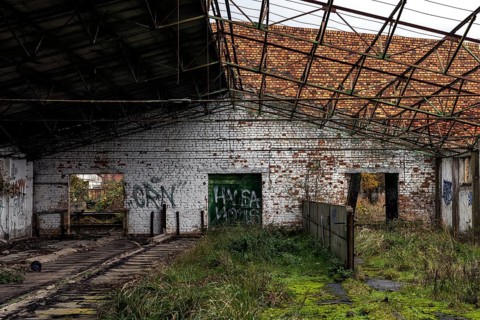 Former hall, dilapidated plant of a former agricultural production cooperative of the former GDR,