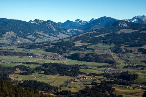 View from the Bolsterlanger Horn of villages in the Illertal and mountains of the Allgäu Alps,