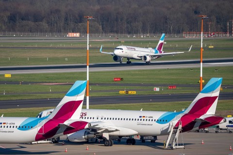 Eurowings aircraft, on field positions and on landing, Düsseldorf airport, DUS