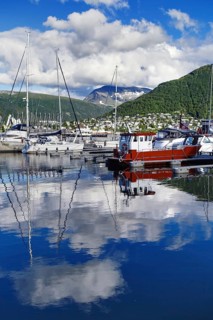 Harbour view with boats and reflections in the water, Tromso