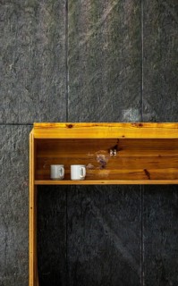 Temporary wooden rack with empty coffee cups on an interior construction site, Berlin, Germany