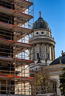 Scaffolding at Gendarmenmarkt with a view of the German Cathedral in the background, Berlin,