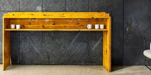 Temporary wooden rack with empty coffee cups on an interior construction site, Berlin, Germany