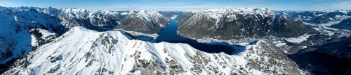Aerial view, epic view of mountain landscape with snow in winter, summit of Bärenkopf, Achensee,