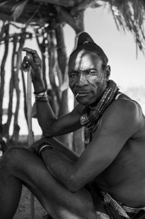 Elderly man, leader of the Himba, traditional Himba village, Kaokoveld, Kunene, Namibia