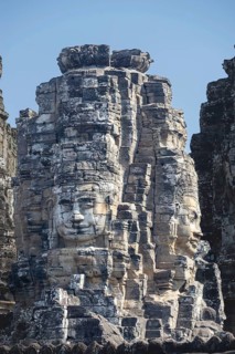 Huge stone-carved faces of Bodhisattva Lokeshvara, also Avalokiteshvara, Bayon Temple, Angkor Thom,