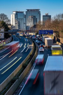 The A40 motorway, Ruhrschnellweg, in Essen, city skyline, Evonik office building, traffic jam in