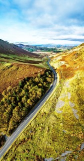 Autumn colours over Mach Loop from a drone, Minffordd, Tywyn, Wales, UK