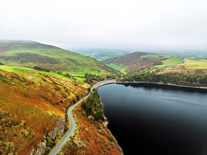 Autumn colours over Llyn Clywedog and Clywedog Reservoir from a drone, Llanidloes, Wales, UK