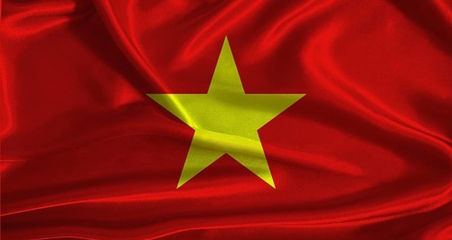 Vietnam flag with cloth textured background. National flag of Vietnam with realistic texture