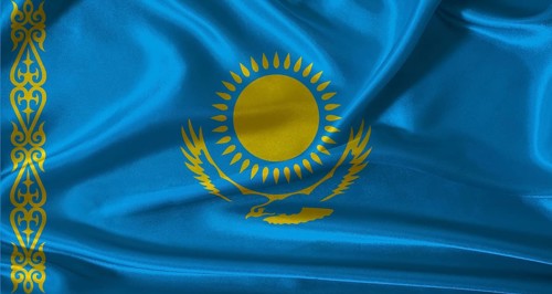 National flag of Kazakhstan with cloth texture. Kazakhstan flag with realistic texture background