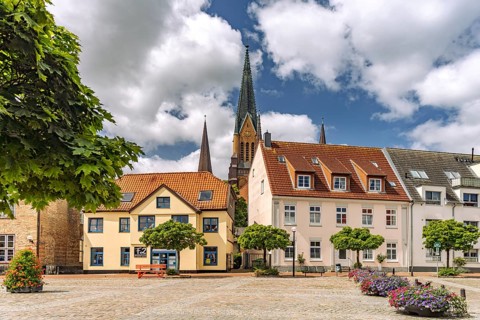 The Town Hall Market in Schleswig's Old Town and St. Peter Cathedral, City of Schleswig,