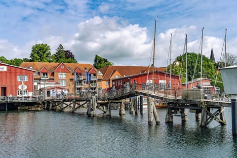 Eckernförde wooden bridge and the Siegfried shipyard at the inland port in Eckernförde,