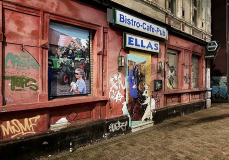 Decaying façade covered with graffiti in a difficult district, Gelsenkirchen, Ruhr area, North