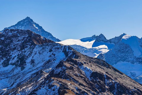 Snow-capped peaks of the Garde de Bordon and Dent d' Herens mountains, Val d'Anniviers, Valais