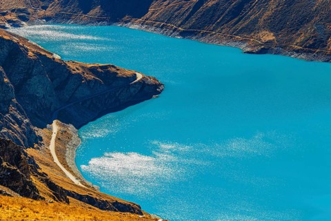The turquoise Lac de Moiry Reservoir, Val d'Anniviers, Valais Alps, Canton of Valais, Switzerland