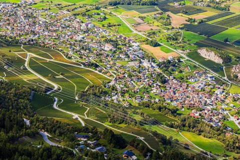 The towns of Chalais and Rechy in the Rhone Valley, view from Vercorin, Val d'Anniviers, Valais