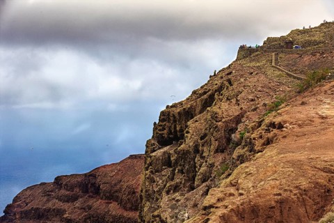 Dramatic cliffs above the sea under a cloudy sky, Haria Lanzarote, Canary Island
