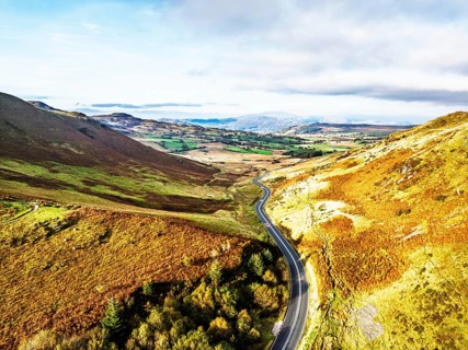 Autumn colours over Mach Loop from a drone, Minffordd, Tywyn, Wales, UK