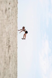 Symbolic picture, abstract, woman falling, rotated image on the Etosha pan, salt pan, Etosha