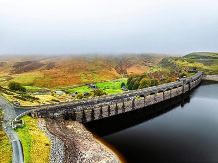 Autumn over Claerwen Dam, Claerwen Valley, Elan Valley Reservoir, Rhayader, Powys, Wales, UK