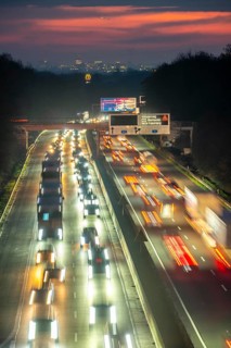 Evening traffic on the A52 motorway, between Düsseldorf and Essen, in front of the Breitscheid