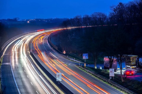 Evening traffic on the A52 motorway, between Düsseldorf and Essen, at the Ruhr Valley Bridge,