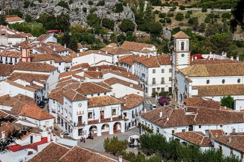 View over the white houses of village Grazalema, Parque natural de la Sierra de Grazalema,
